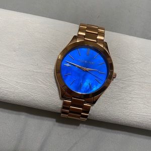 Micheal Kors Rose Gold Watch with blue face